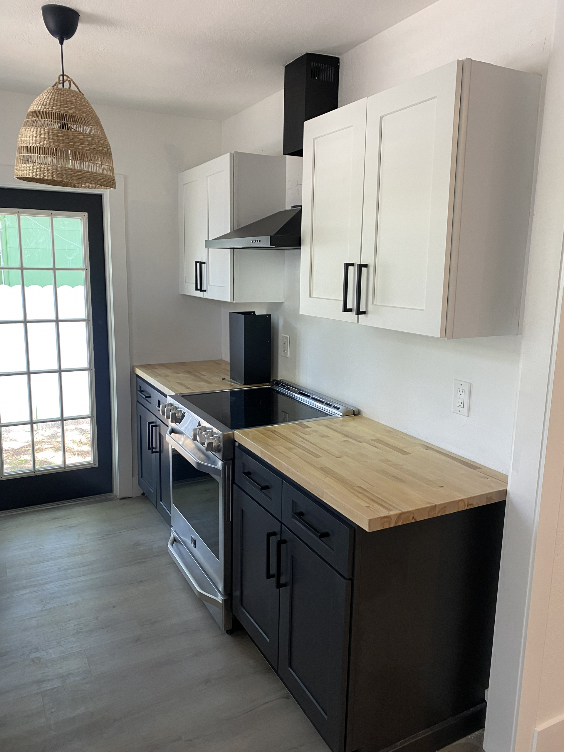 Kitchen cabinetry illustrating a cabinet painting refresh